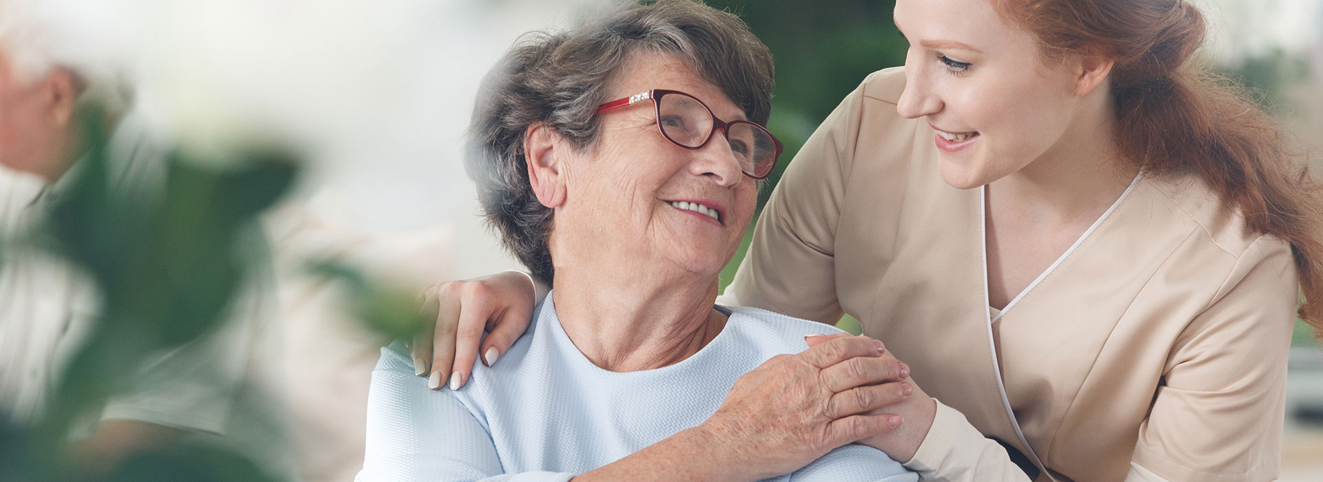 home caregiver with senior woman